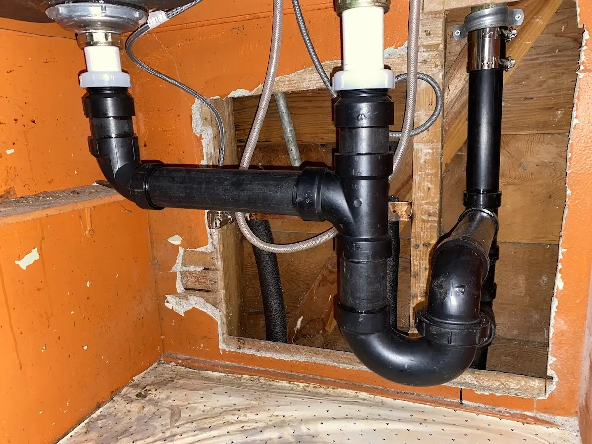 Professional Garbage Disposal Repair equipment and tools on the job in Whiting